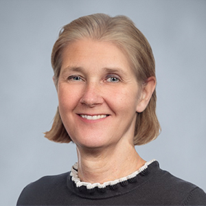 headshot of Dr. Flanigen